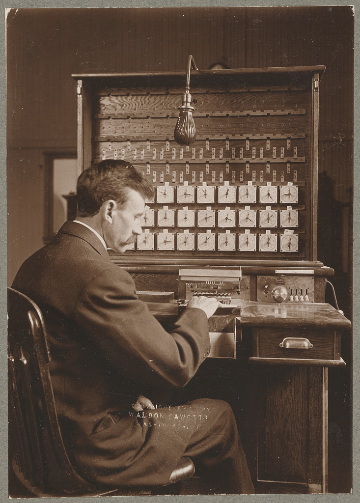 U.S. Census Bureau staff using Hollerith electrical tabulator